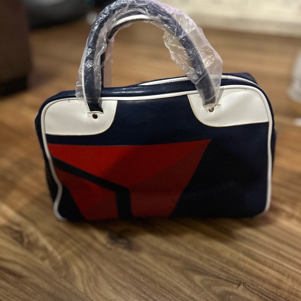 Deltas 75th anniversary bag designed by Zach Posen